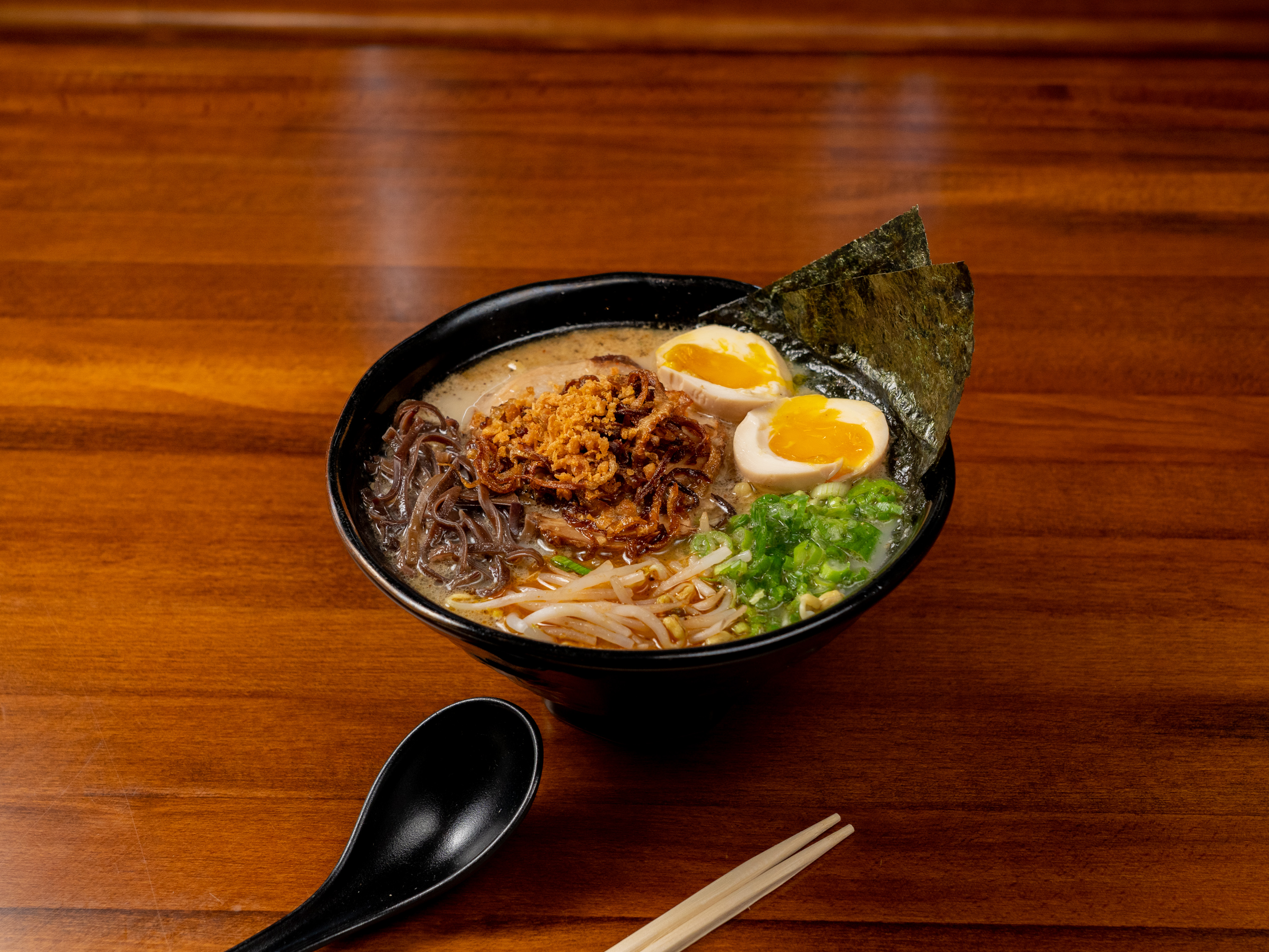 Garlic Tonkotsu ramen bowl — Bakudan Ramen San Antonio