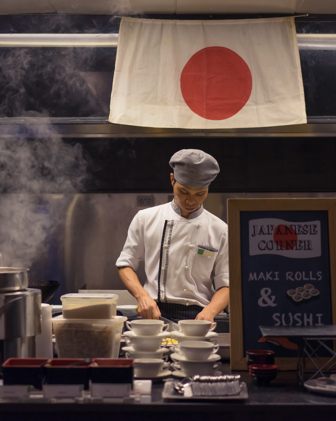 Bakudan Ramen chef with Japanese flag — our journey from Japan to San Antonio Texas